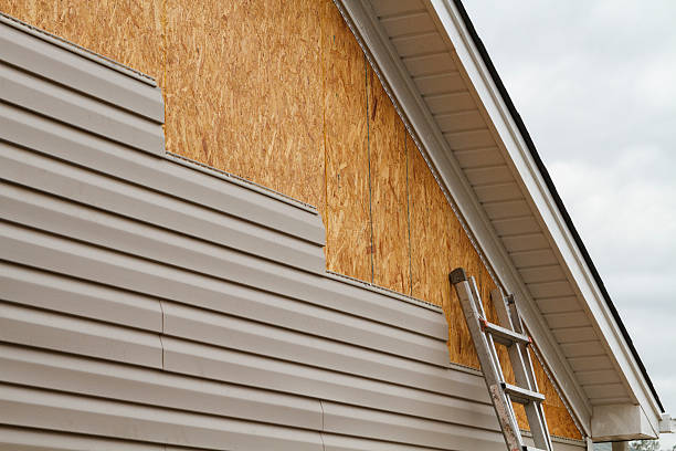 Professional Siding Contractor technician working in Woodward, PA